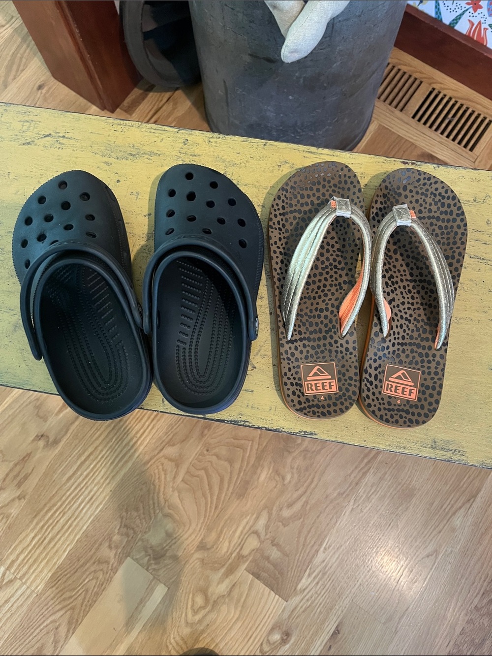 Reef Metallic Gold and Orange Leopard-Print Flip Flops and Black CROCS.